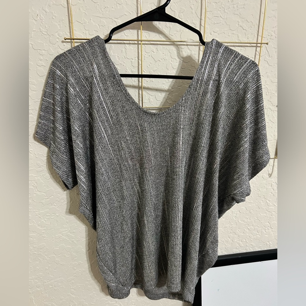 Metallic silver top